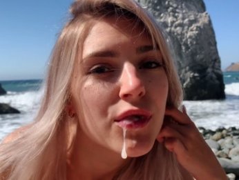 A Russian teen girl swallows hot cum on Californian public beach Porn